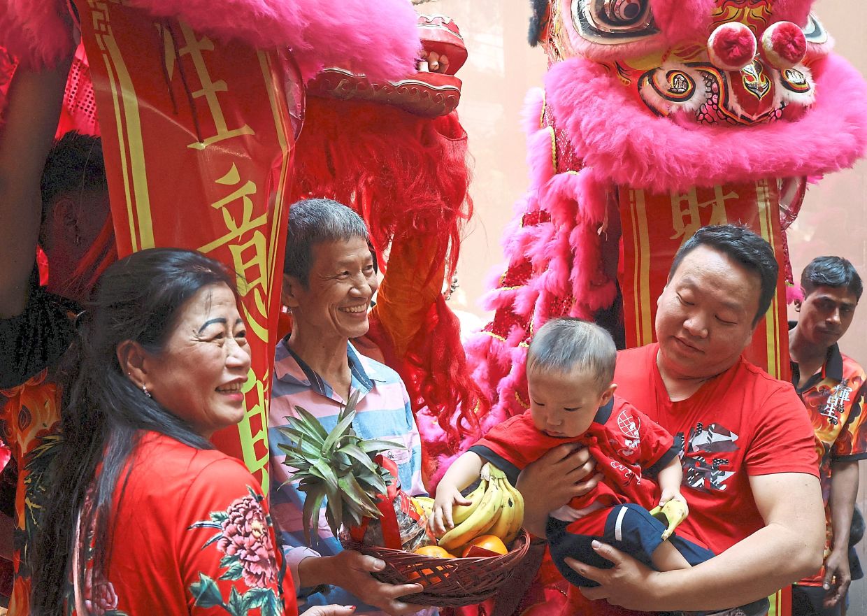 Members of the Chinese community participate during the lion dance to mark Lunar New Year celebrations in Kolkata, India, February 17, 2026. REUTERS/Sahiba Chawdhary
