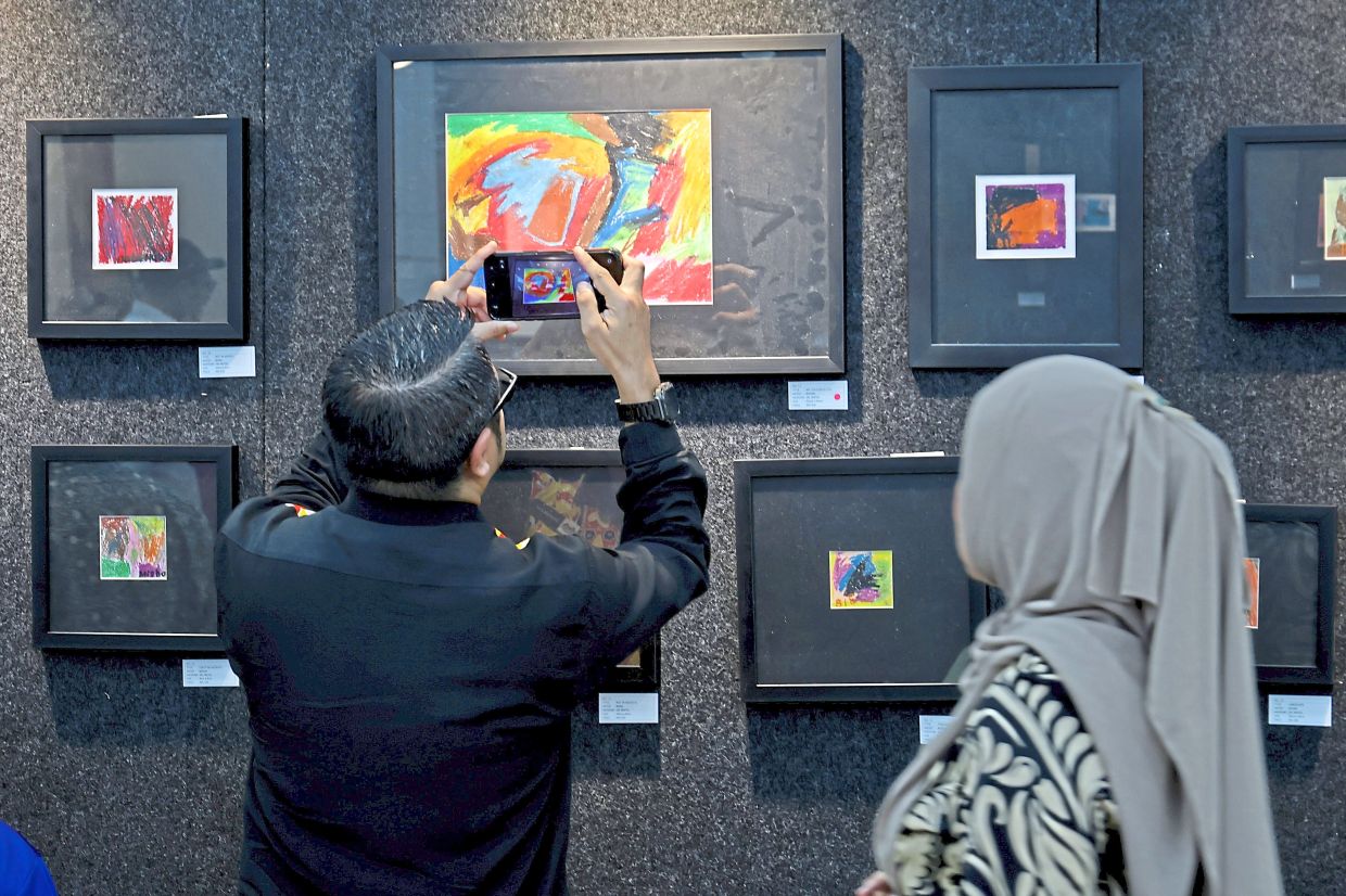  Art pieces from classes conducted by Rosli for Sekolah Sinar Harapan students on display at the Penang Legislative Assembly building.