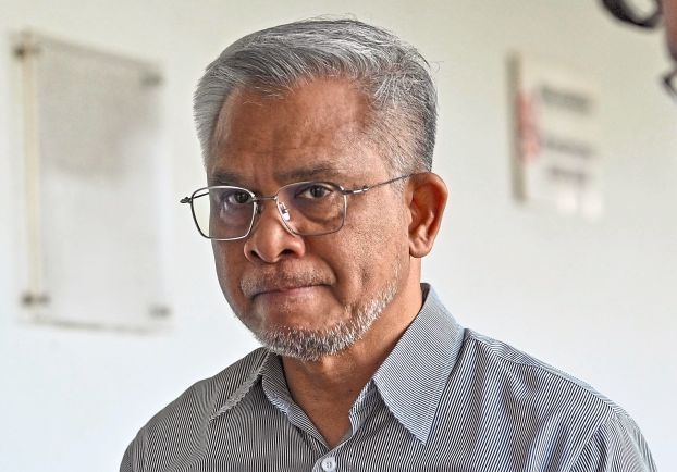 Islamic finance figure charged in trading case