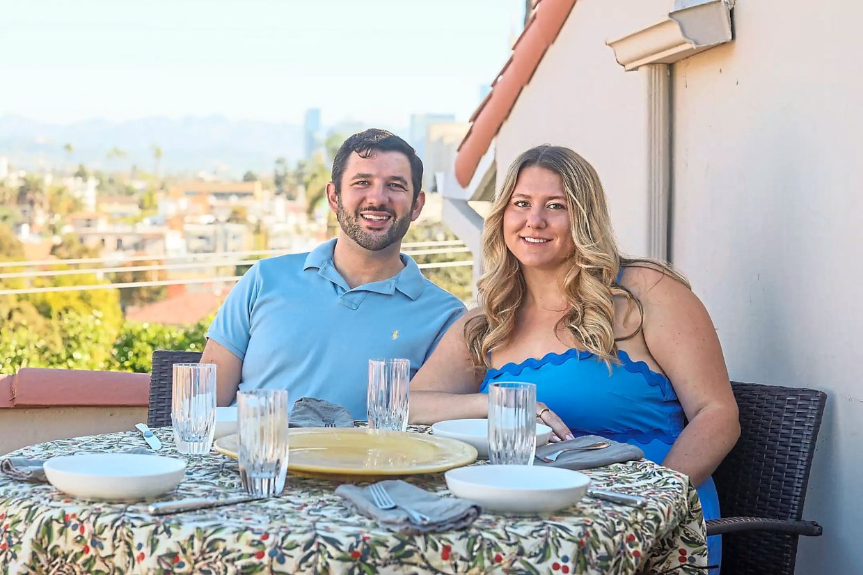 Chait (left) and van Hulsen relax on their condo rooftop, sitting on patio furniture they bought in Venice through social media.