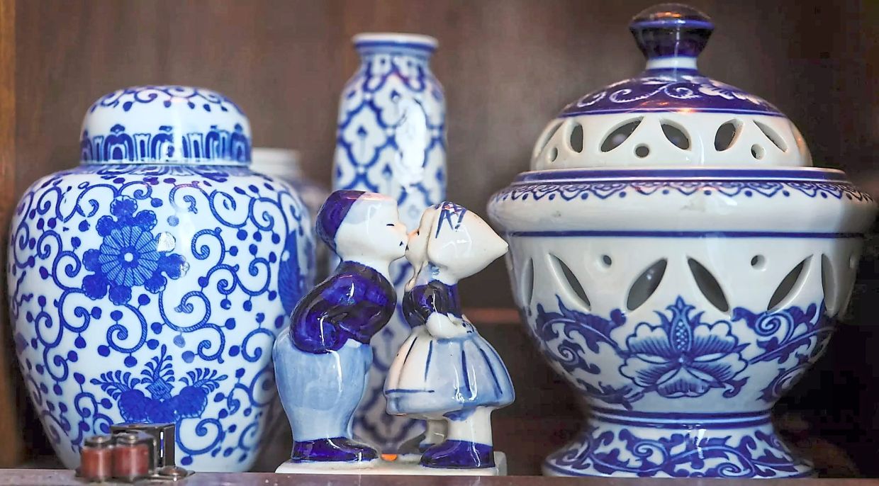 Dutch ceramic figurines and Asian ginger jars from various estate sales and thrift stores.