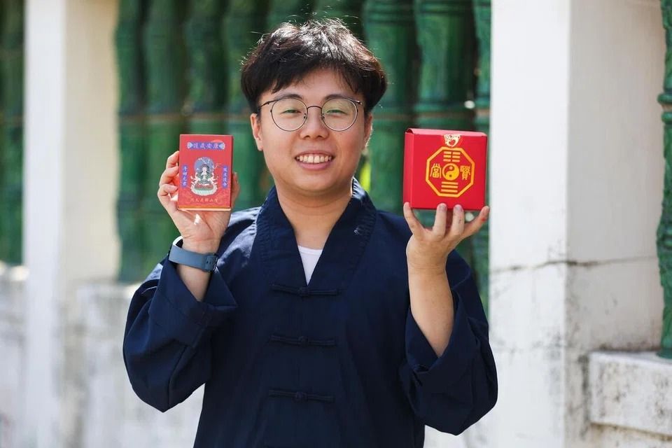 Master Eugene Choy said that during a discussion at the temple the idea was conceived to make use of the “stamp rally” culture and blind box trend to introduce the Taoist deities to the young during Chinese New Year. - ST