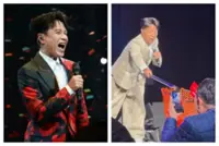 HK singer Hacken Lee collects ang pow packets with fishing net at recent concert