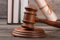 Two foreign nationals jailed, caned for overstaying in Brunei