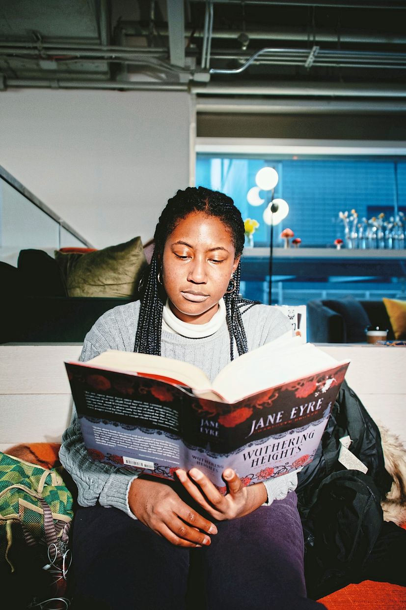 Katie Alerte reads 'Wuthering Heights' at P&T Knitwear, a bookstore in New York.