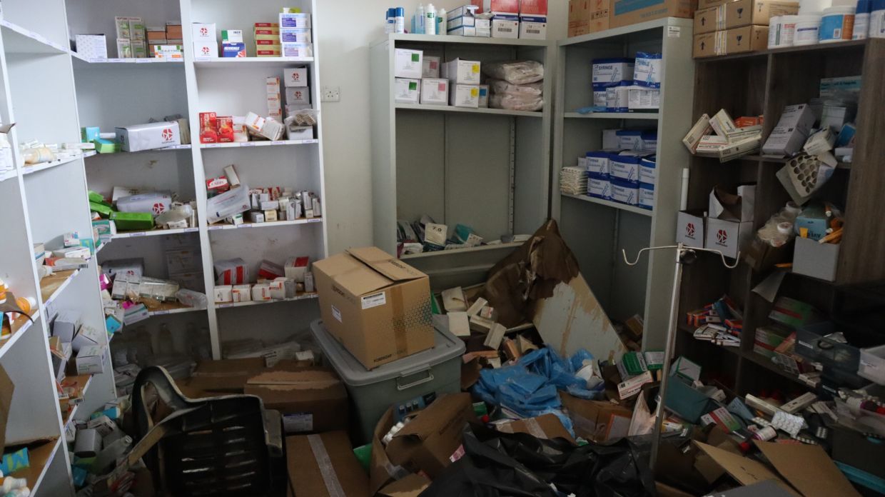 Medicines, medical supplies and furniture left in disarray inside the clinic after being inundated by floodwaters. 