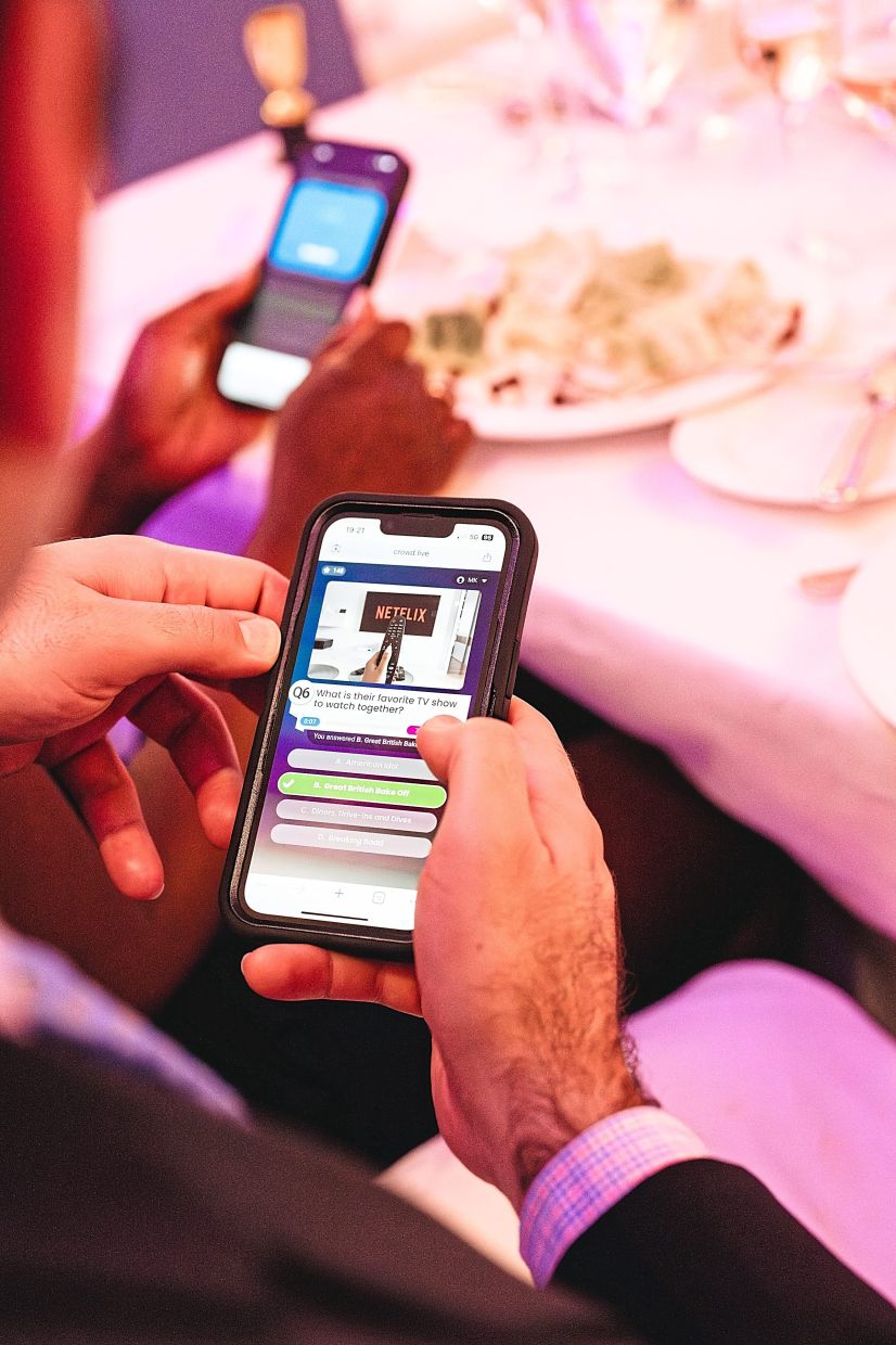 Richards and Guan distributed fun-fact cards about themselves during the cocktail hour that could later be used for reference in their trivia contest. — KARA COLEEN/The New York Times