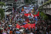 Filipinos protest against corruption on anniversary of Marcos Sr’s ouster