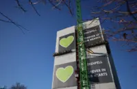 Grenfell families urge UK government to preserve tower's walls bearing handprints