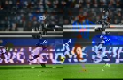 Soccer-Last-gasp penalty sends Atalanta past Dortmund and into last 16