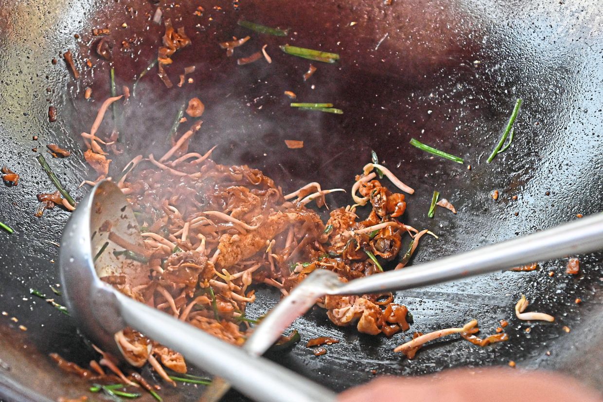 Result in a traditional ‘char kuey teow’ full of sizzle. — Photos: Bernama