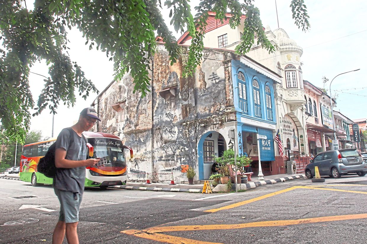 Tourists like Ipoh for its old-world charm of traditional coffeeshops. — Photos: RONNIE CHIN/The Star and filepic