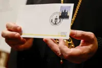 Vatican unveils unusual postage stamp honouring Ukraine's Catholics