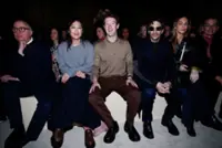 Prada layers winter jackets over light dresses at Milan show as Zuckerberg's presence fuels smart glasses talk
