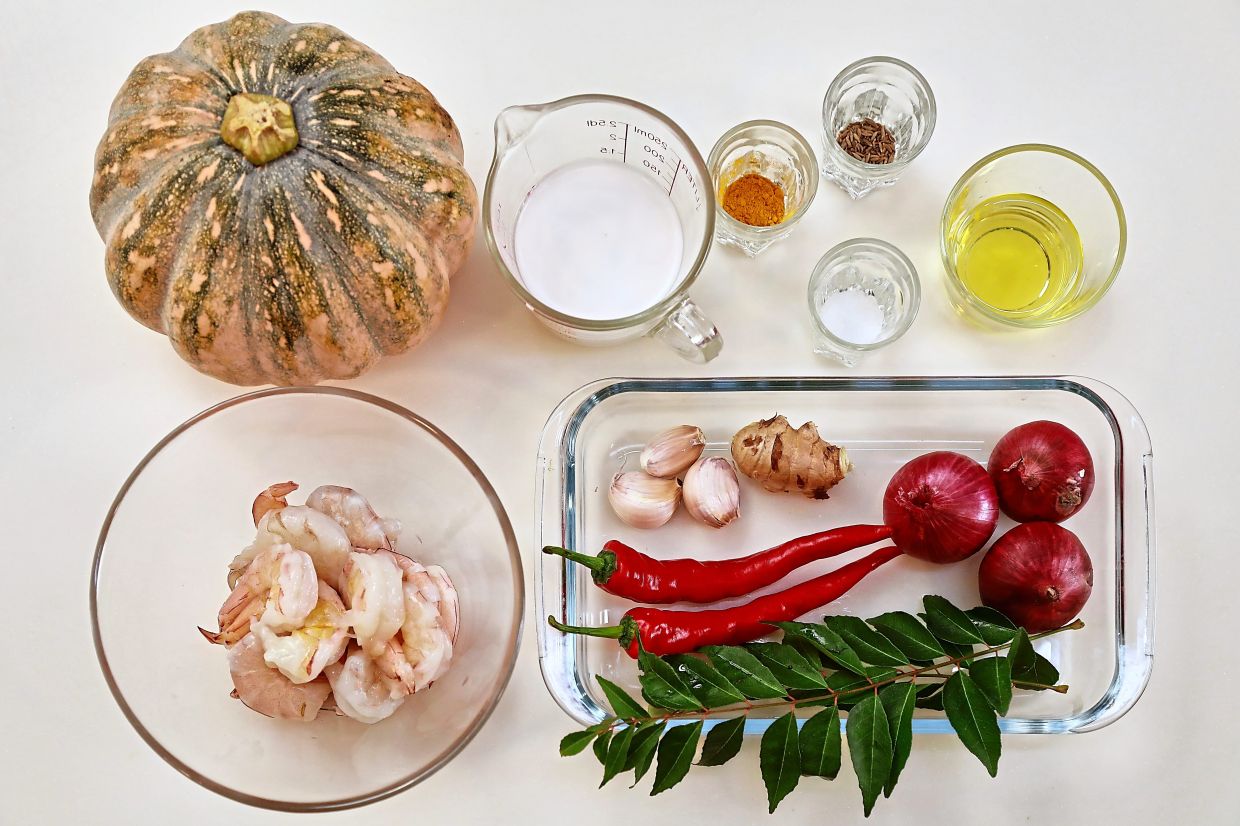 Ingredients for pumpkin and prawns in coconut milk.