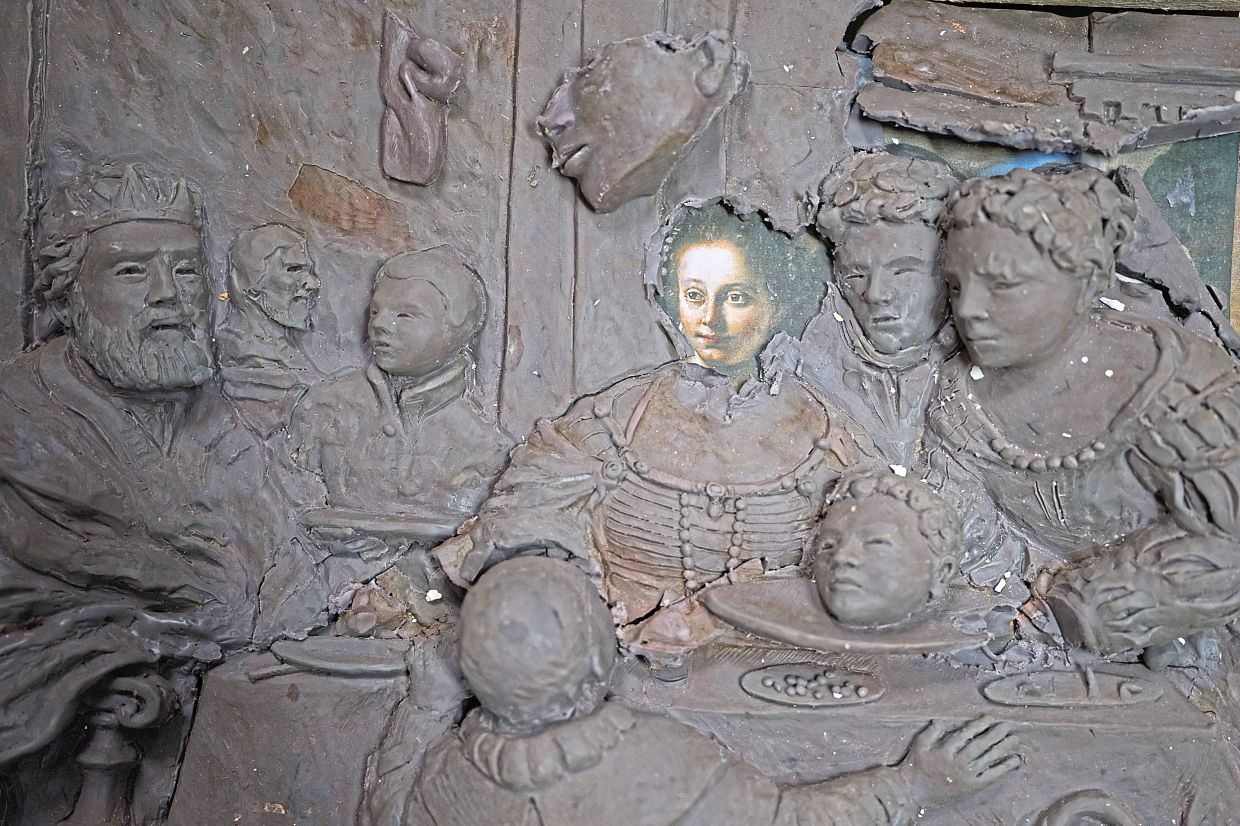 A painting transformed into bas-relief is on display at the laboratory of tactile education at the Omero Tactile Museum. Photo: AP