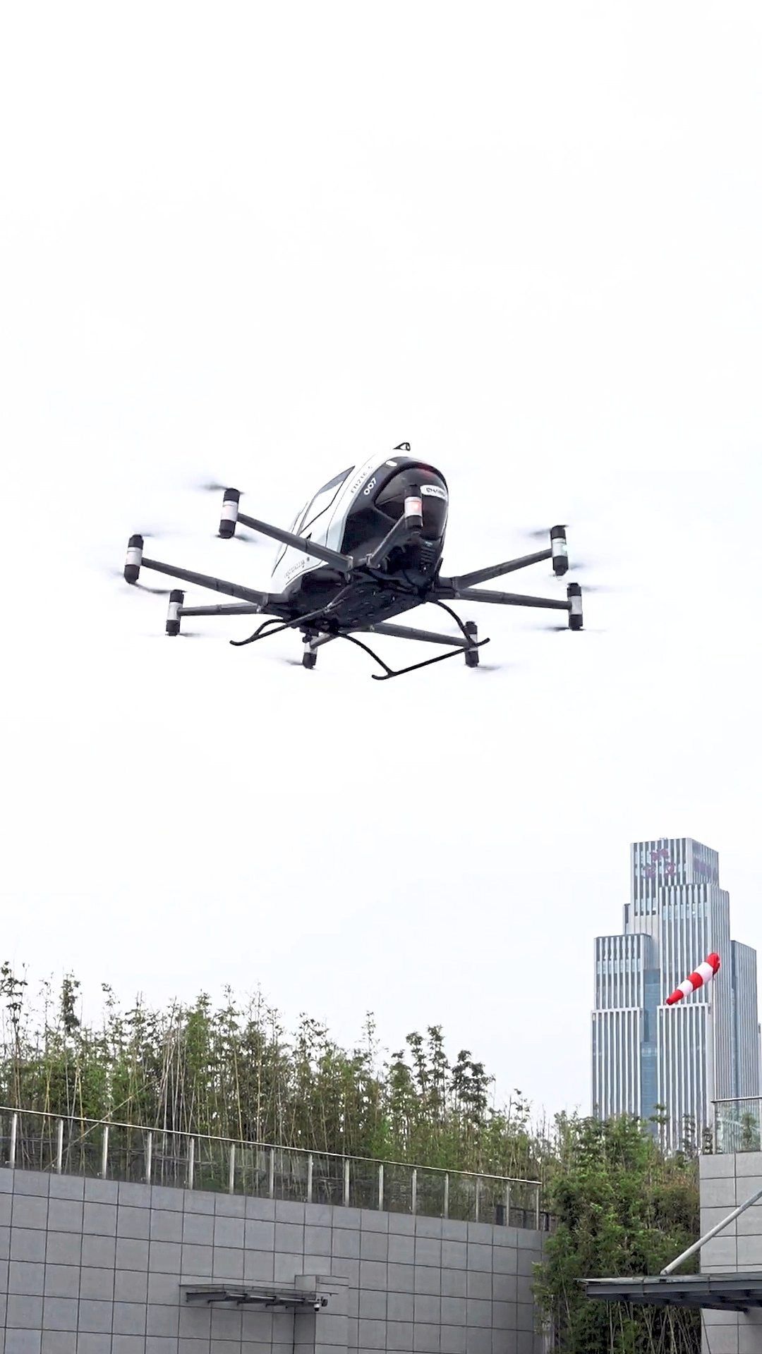 A two-seater flying taxi takes to the sky in Hefei, The remotely-controlled craft can travel 25 minutes on a charge and go about 80 miles per hour. — Qilai Shen/The New York Times