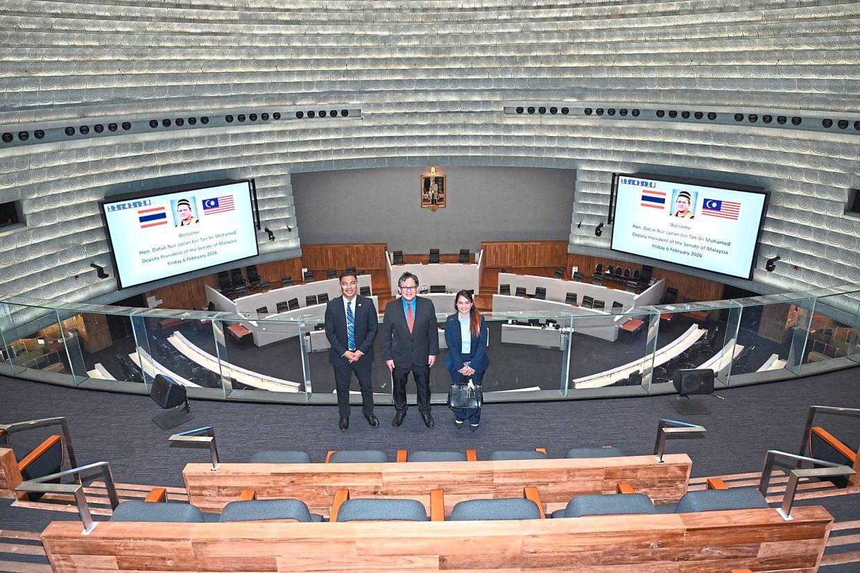 The writer (centre) and his team at the Thai Senate. He says the Thai Senate continues to anchor the country’s political architecture.