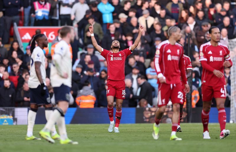 Soccer-Liverpool surge to 5-2 win over West Ham, Brentford and Everton win