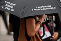 Indonesian scholars back lawsuit against minister’s denial of 1998 mass rape