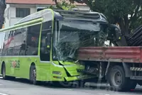 Bus driver trapped after crashing into lorry on Singapore's Upper East Coast Road