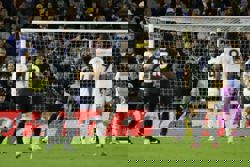 Soccer-Man City move two points behind Arsenal after 1-0 win at Leeds