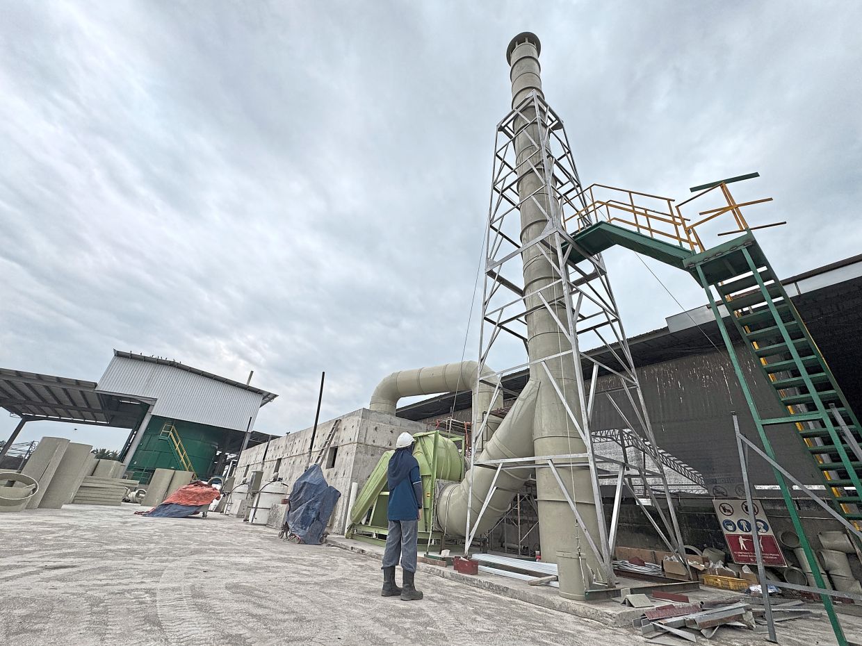 A trench system which is still under construction connected to an air scrubber at QL Poultry Farms in Pajam, Negri Sembilan.