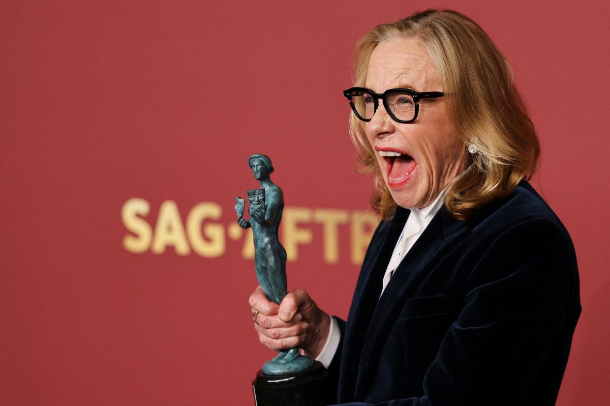 Amy Madigan poses with the Outstanding Performance By A Female Actor In A Supporting Role award for 'Weapons' during the Actor Awards, in Los Angeles. Photo: Reuters