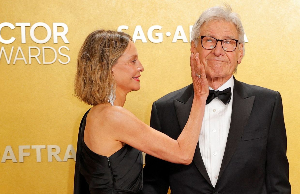 Harrison Ford and his wife Calista Flockhart pose on the red carpet during the Actor Awards, in Los Angeles, California, U.S., March 1, 2026. REUTERS/Mike BlakeTPX IMAGES OF THE DAY