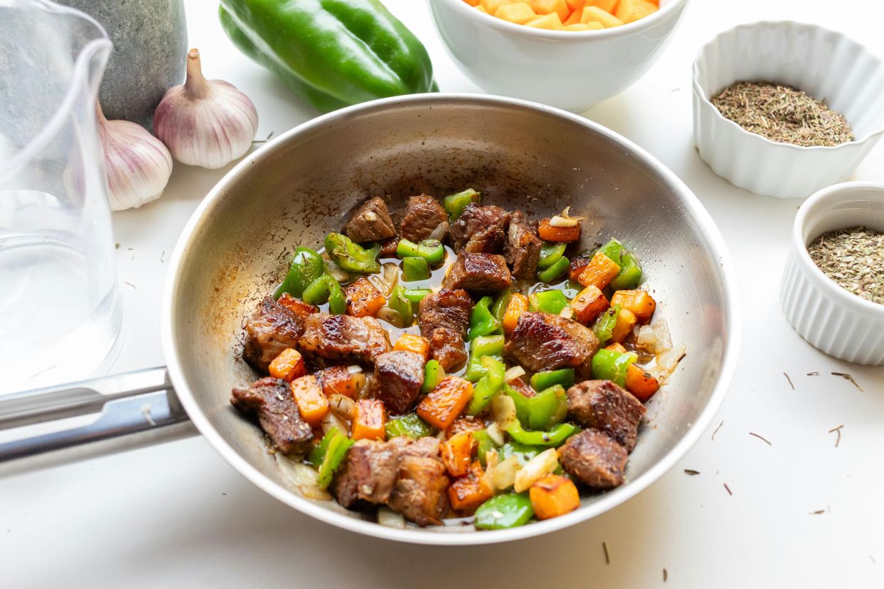 The subtle substitution strategy involves treating meat as a condiment in a dish rather than the main star. — LAURA OLIVEIRA/Pexels