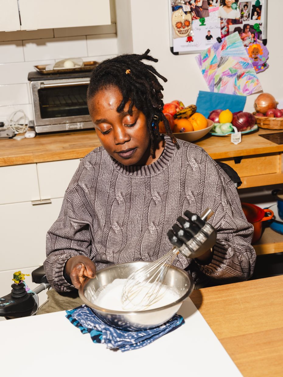 Komolafe attends weekly occupational therapy sessions to learn how to use her prosthetic hands and legs.