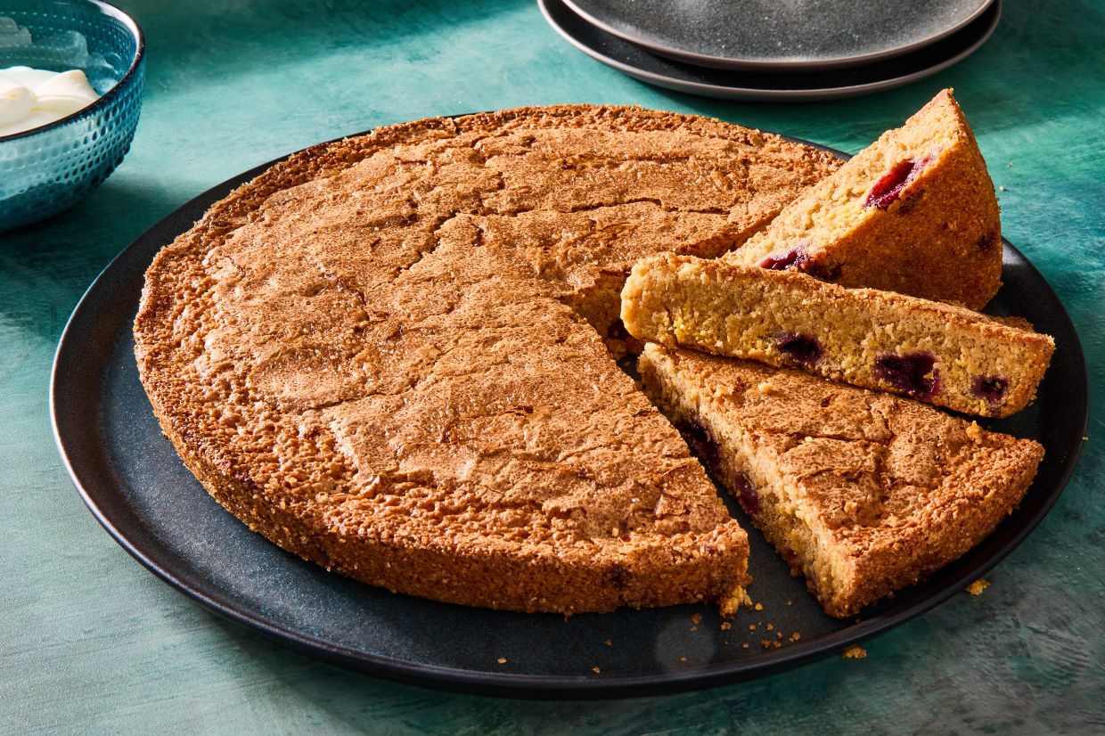 Brown butter cornmeal cake. At the popular Radio Bakery in Brooklyn, a version of this unassuming brown butter cake, based on the classic French financier, sits among the fruit-forward stunners. Food styled by Barrett Washburne. (Julia Gartland/The New York Times)