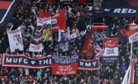 Soccer-'Proudly colonised by immigrants': Man Utd fans turn tables on Ratcliffe with banner