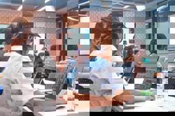 Connected by code: Community insights on harnessing AI for software development