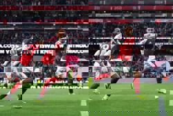 Soccer-Arsenal claim nervy win over Chelsea, Man Utd go third