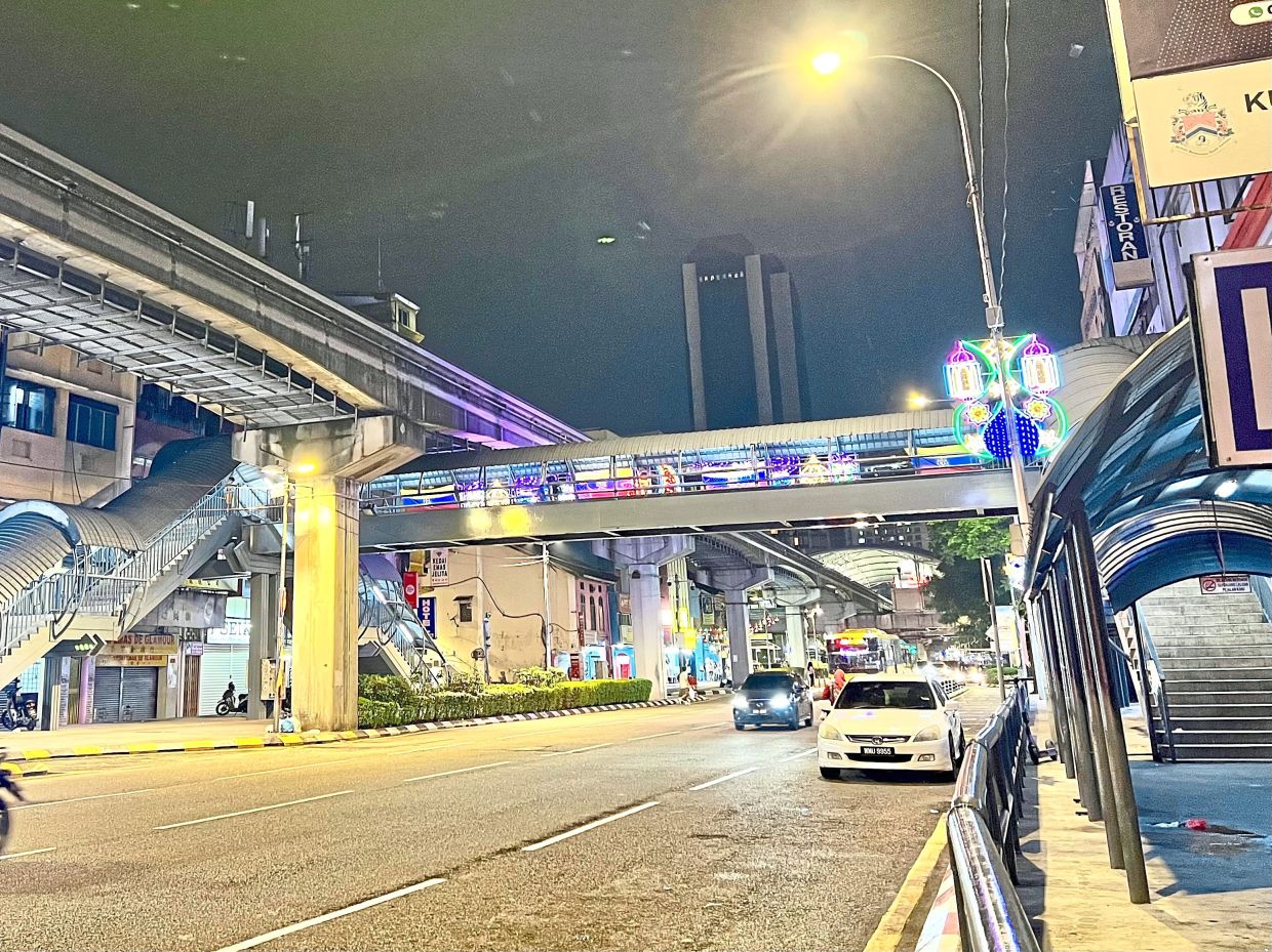In 1986, Sudirman gave a free concert in this very area in Chow Kit, minus the LRT tracks and overhead bridge. — GISELE SOO/The Star