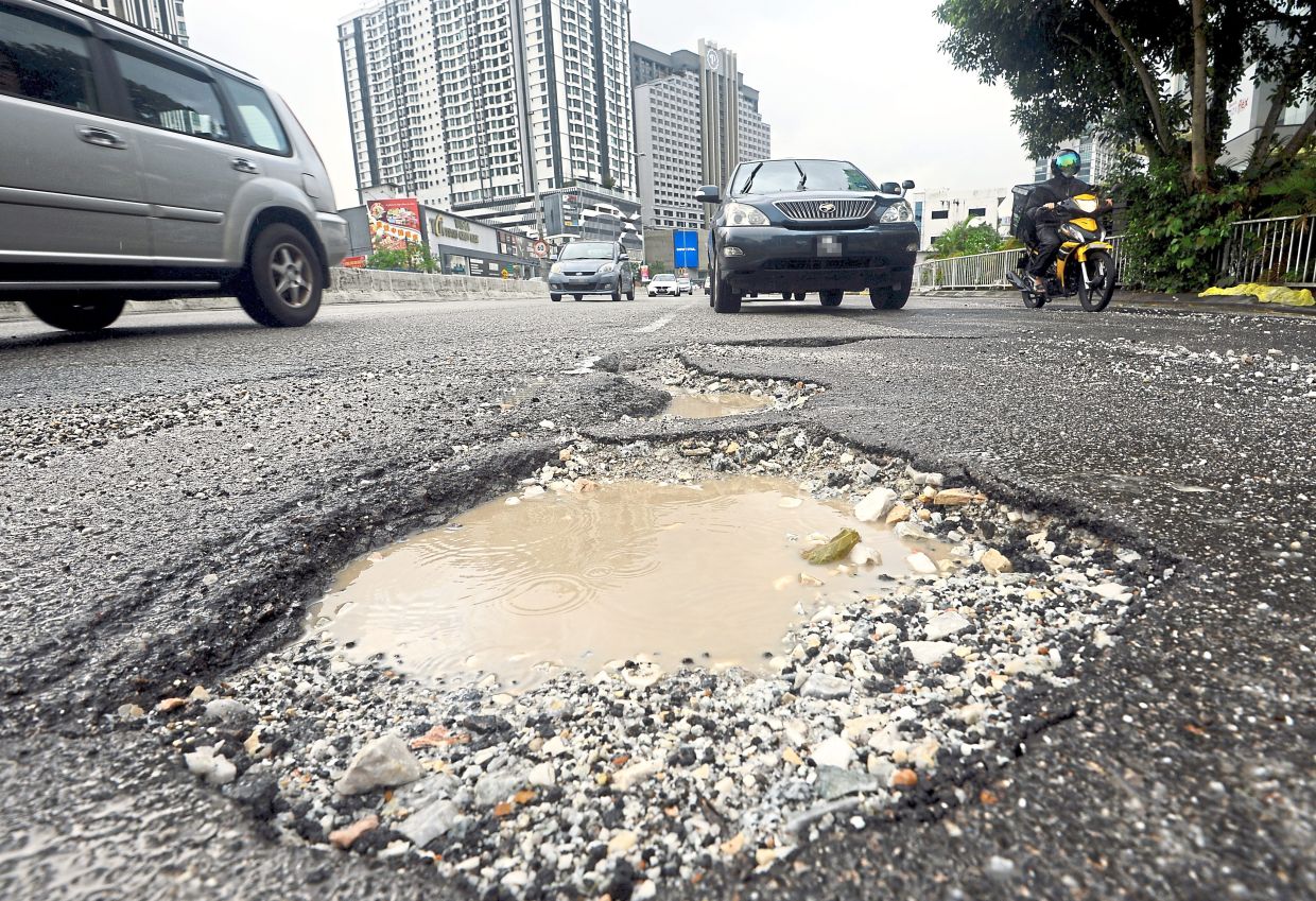 City Hall plans to complete resurfacing major roads in Kuala Lumpur in phases. — Filepic