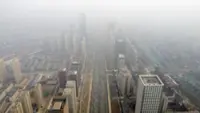 Heavy fog and dust alert issued across North and Northwest China