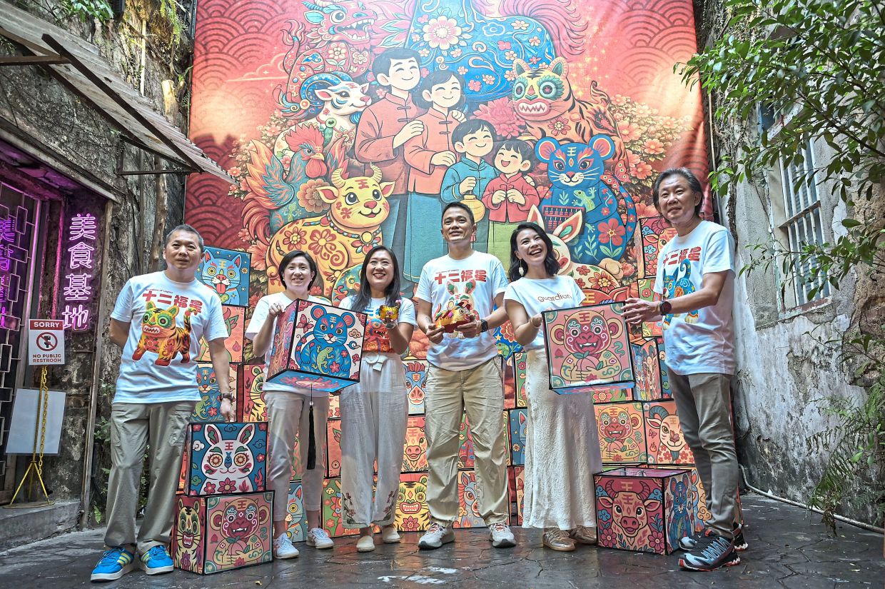 (From third left) Chang and Chor with Guardian Health and Beauty, Malaysia and Brunei managing director Priscilla Wu (second right) at the Guardians of Legacy art installation
