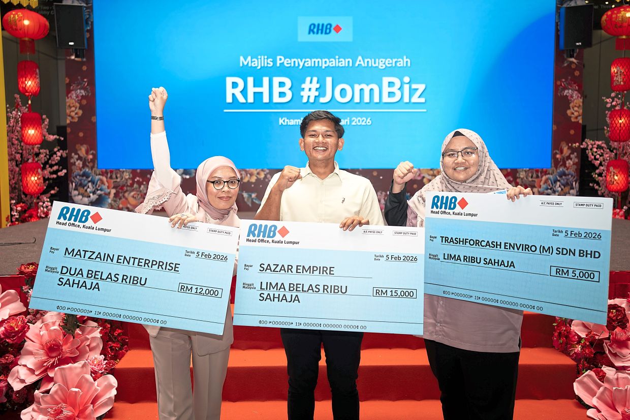 Standing in success: (from left) Siti Nurul, Hanis Irfan and Dina.