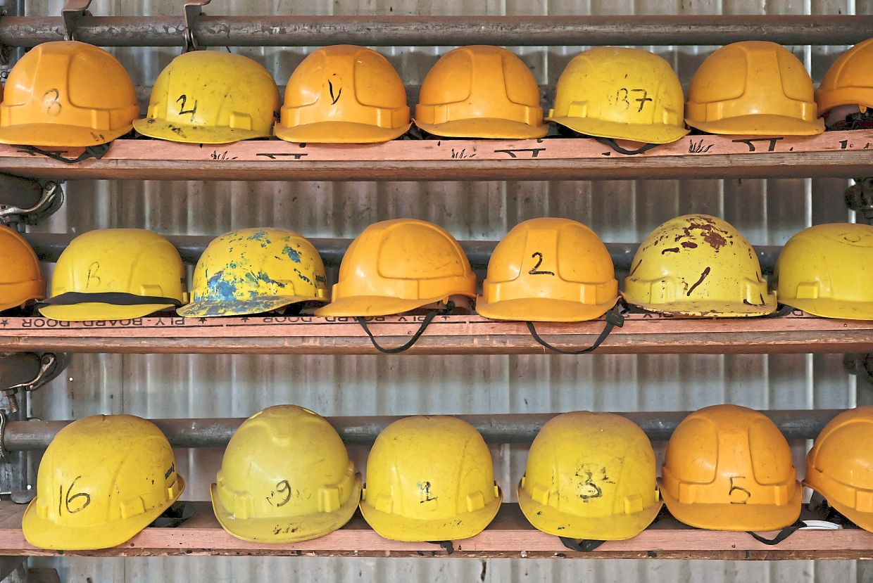 Hard hats lining the shelves at Motherland Overseas in Kathmandu. — Reuters