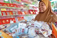 Baju Melayu buttons have lost their charm