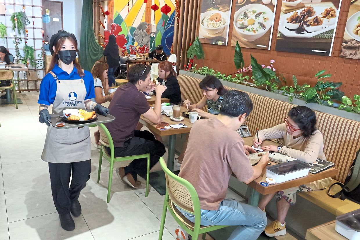 Customers dining in at a popular ‘kopitiam’ in Johor Baru.