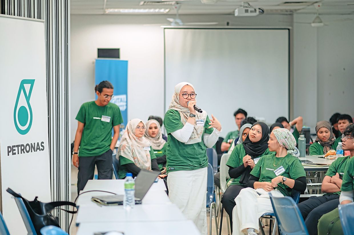 Participants exploring digital skills during the BeDigital Bootcamp session in Bukit Mertajam, Penang.