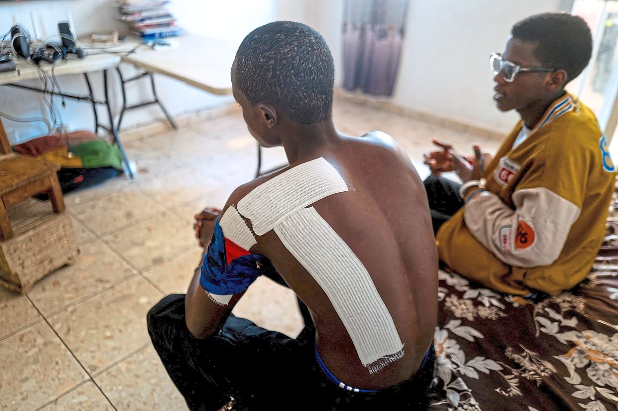 Barry and Diallo said they were beaten up by police at the UCAD campus during protests over financial aid that turned violent in Dakar, Senegal. — Reuters