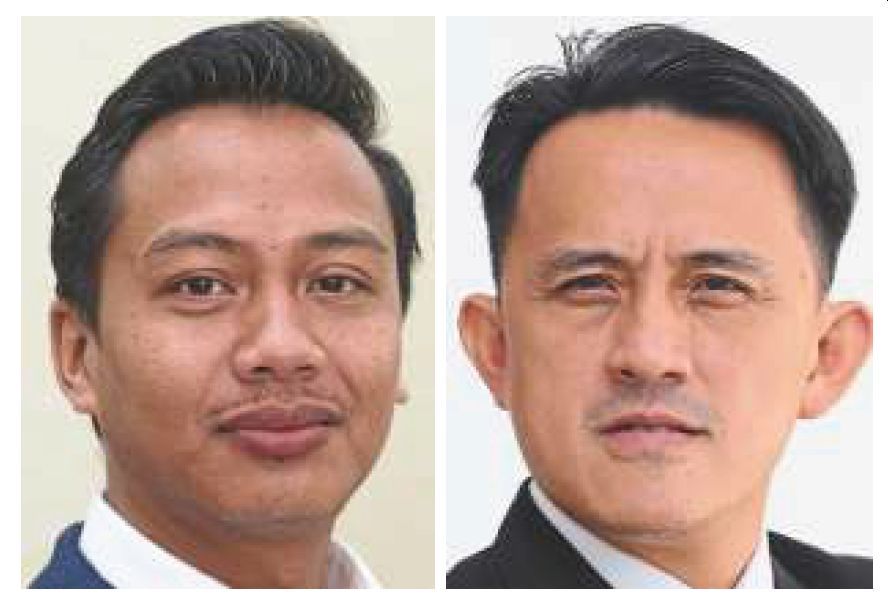 Replaced: Portfolios previously held by Fahmi (left) will be taken over by Goh.