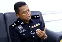 Boy injured after neighbour fires air rifle at house