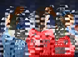 Soccer-Double joy for Arsenal as Saka winner at Brighton sends them seven points clear