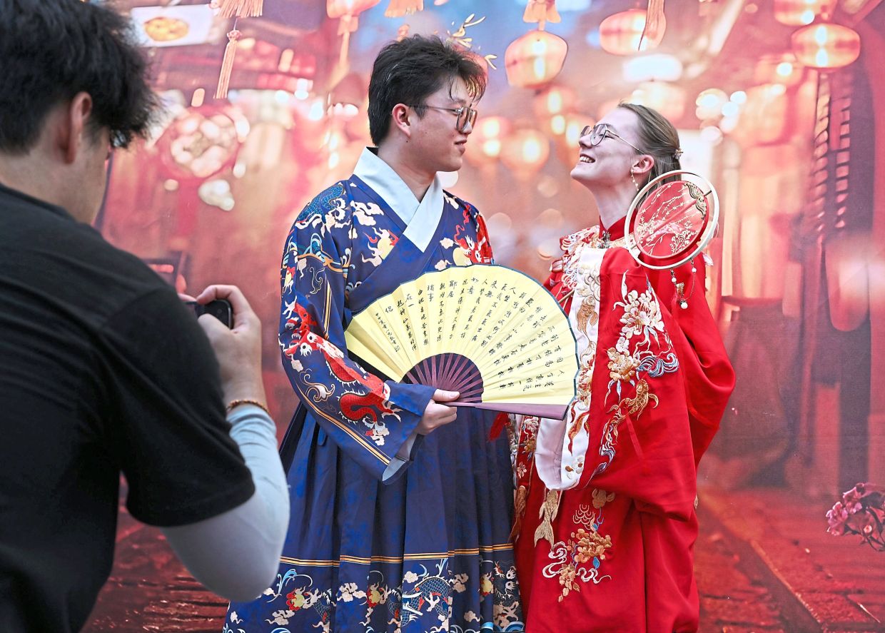 Low (left) and Stasiak dressed in ‘hanfu’ during the Tanjong Chinese New Year Celebration. — Photos: KT GOH/The Star