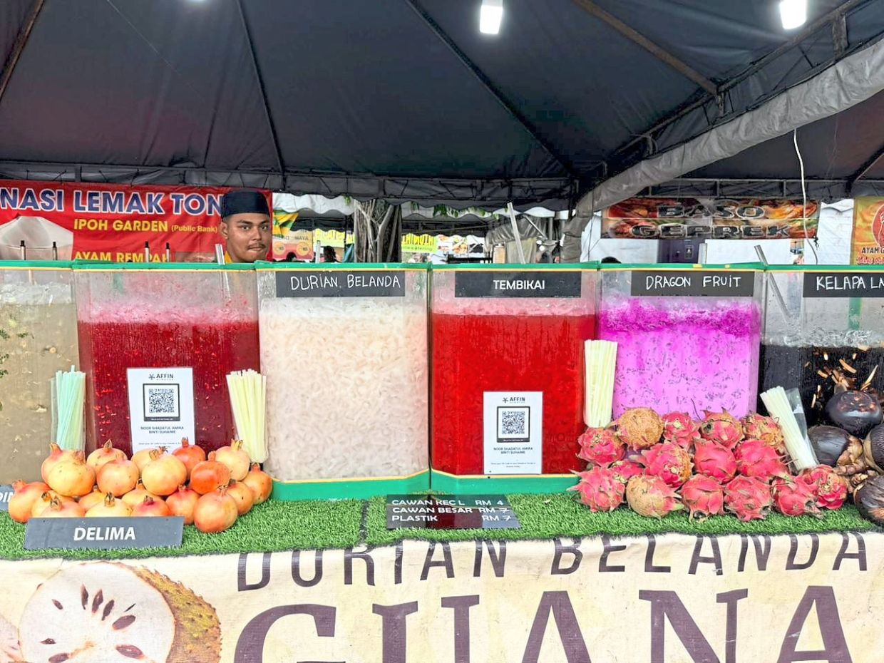 Muhamad Reza, whose stall is at Stadium Perak, sells fruit juices.